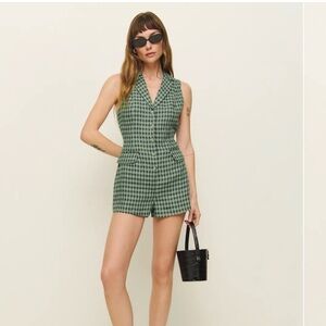 Reformation Leila linen romper, cactus—chic, lightweight, travel-ready.